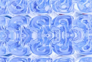 Below shot of interlocked One Water bottles ready for packaging.