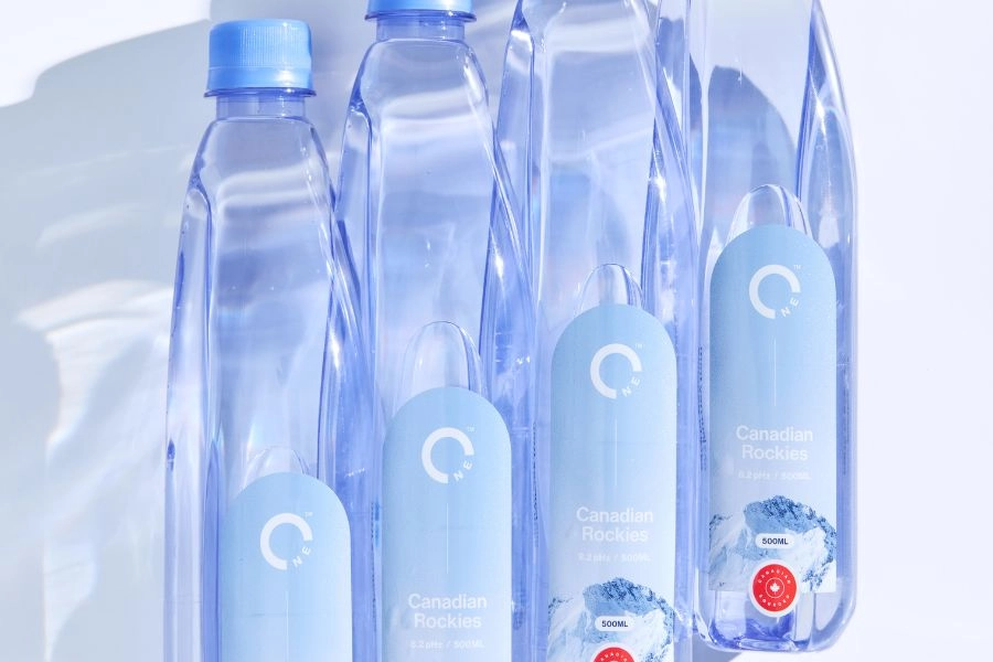 One Water Bottles interlocked in an ascending vertical pattern.