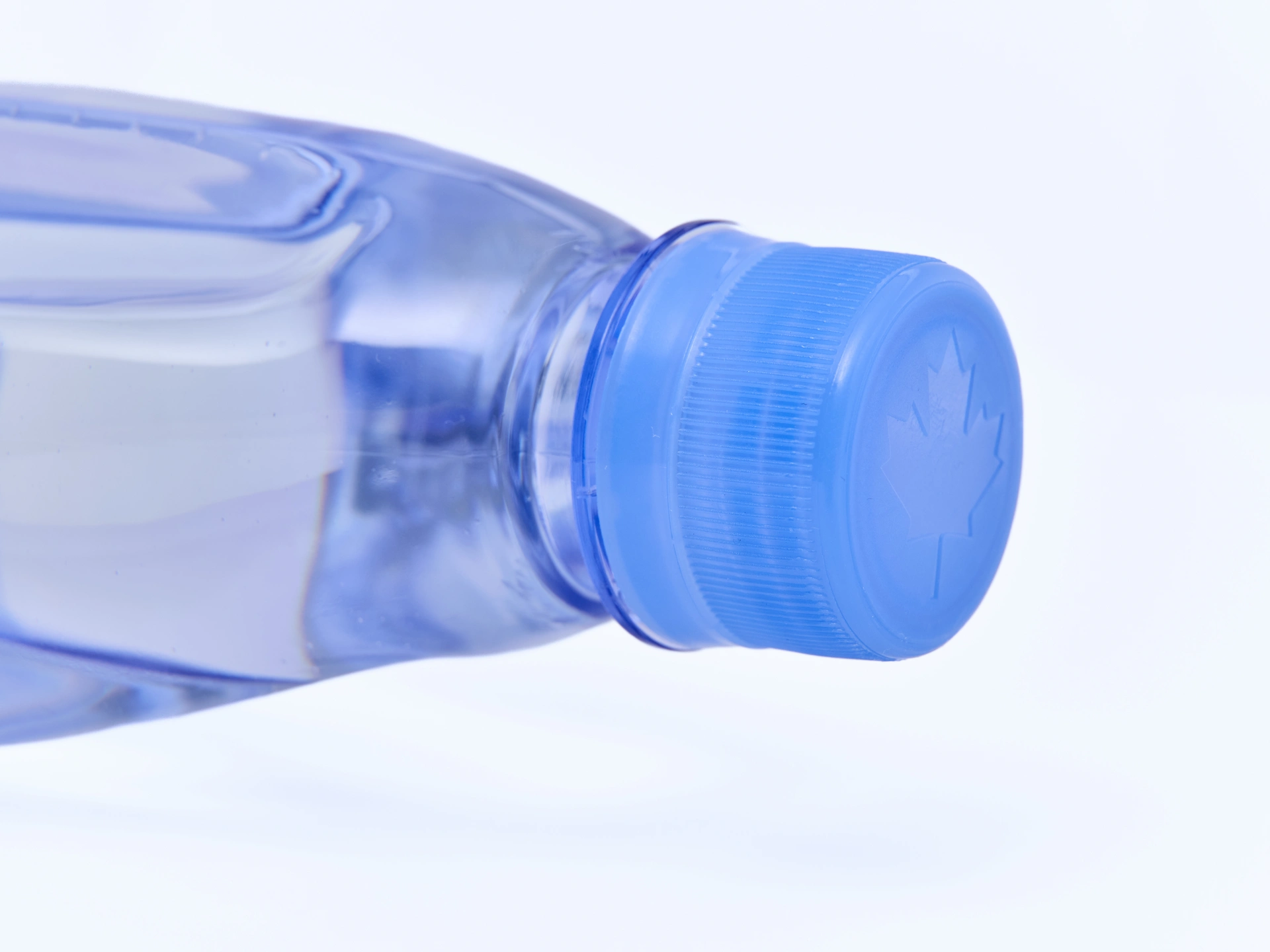 Closeup of the One Water bottle cap from an angle.